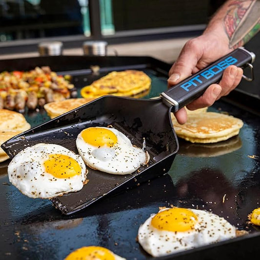 Pit Boss Ultimate Griddle Grub Shovel โ Wide Griddle Spatula for Smash Burgers & Breakfast Foods, Nylon Polymer with SoftโTouch Grip, Builtโin Bottle Opener