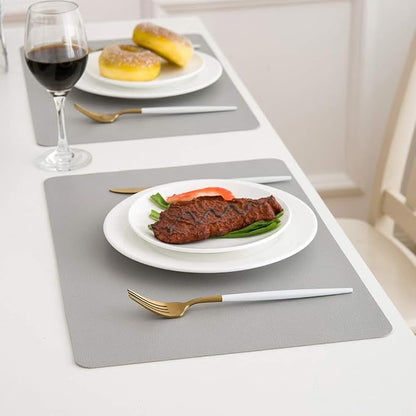 DOLOPL Placemats Set of 6-17"x11.8", Faux Leather Heat Resistant Table Placemat for Dining Table Protection, Waterproof Wipeable & Washable Kitchen Table Mats for Dining,Party,Holiday(Light Gray)