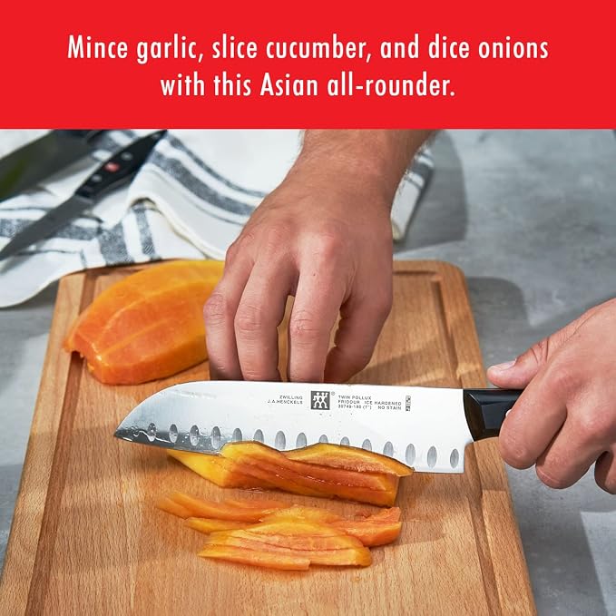 ZWILLING Twin Signature 7-inch Razor-Sharp German Hollow Edge Santoku Knife, Made in Company-Owned German Factory with Special Formula Steel perfected for almost 300 Years, Dishwasher Safe
