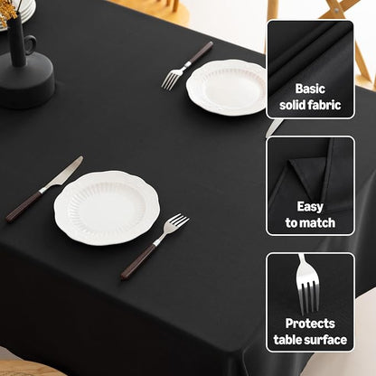 Amazon Basics Thin Rectangle Tablecloths, Water-Resistant Textured Fabric, Wrinkle Resistant, Washable Decorative Table Cover for Dining, Parties, 60" x 104", Black, Pack of 2