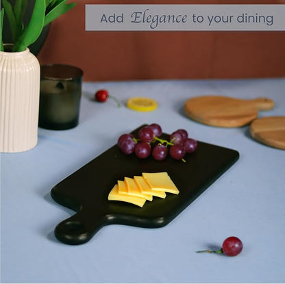The Fine Living Co. Black Charcuterie Board, Paddle Board with Long Handle, Mango Wood Serving Board, Black Cutting Board, Serving Platter for Meat, Pizza, Food-Grade Wooden Serving Trays, 16”x8”