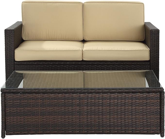 Crosley Furniture Palm Harbor 2-Piece Wicker Outdoor Coffee Table and Loveseat Patio Furniture Set for Porch, Brown with Sand Cushions