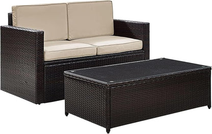 Crosley Furniture Palm Harbor 2-Piece Wicker Outdoor Coffee Table and Loveseat Patio Furniture Set for Porch, Brown with Sand Cushions