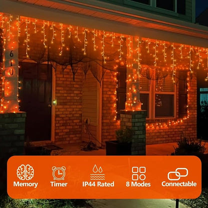 QITONG Orange Lights for Halloween, 33ft 400 LED Icicle Lights for Outside Plug in, Clear Wire Connectable String Light Indoor with 8 Modes