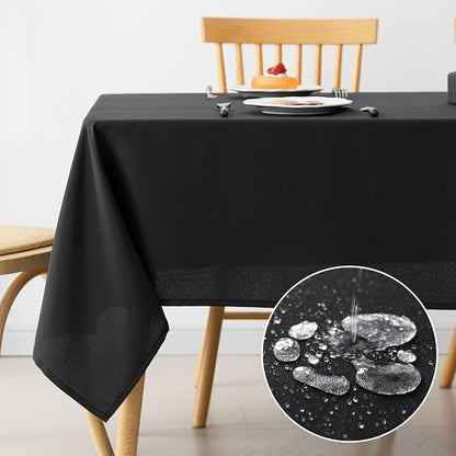 Amazon Basics Thin Rectangle Tablecloths, Water-Resistant Textured Fabric, Wrinkle Resistant, Washable Decorative Table Cover for Dining, Parties, 52" x 70", Black, Pack of 6