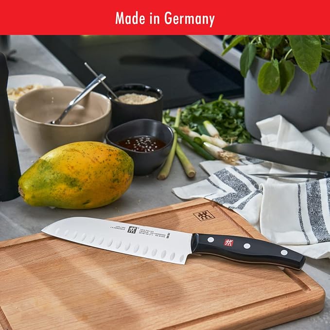 ZWILLING Twin Signature 7-inch Razor-Sharp German Hollow Edge Santoku Knife, Made in Company-Owned German Factory with Special Formula Steel perfected for almost 300 Years, Dishwasher Safe