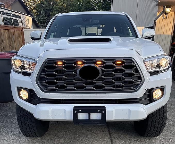 iJDMTOY Tinted Lens 4pc Amber Yellow LED Front Grill Lighting Kit Compatible with Toyota 2020-2023 Tacoma TRD/Off-Road Grille, Includes (4) 12-SMD Lightly Smoked Cover LED Lamps & Wiring Harness