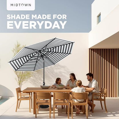 MIDTOWN UMBRELLAS The Lean 9 Feet Outdoor Umbrella With Terylast Matter Stripes (Grey/White Stripes) Polyester Fabric - Auto-Tilt Aluminum Frame Patio Umbrella For Deck, Garden, Pool - Black Pole