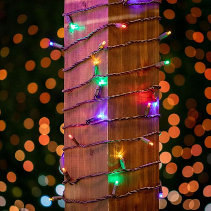 Novelty Lights 50ft 100 LED Multicolor Christmas String Lights, Brown Wire | UL Listed IP55 Commercial Grade Xmas Lights, 6 Inch Spacing, Dimmable, Connectable & Flicker Free For Outdoor & Indoor Use