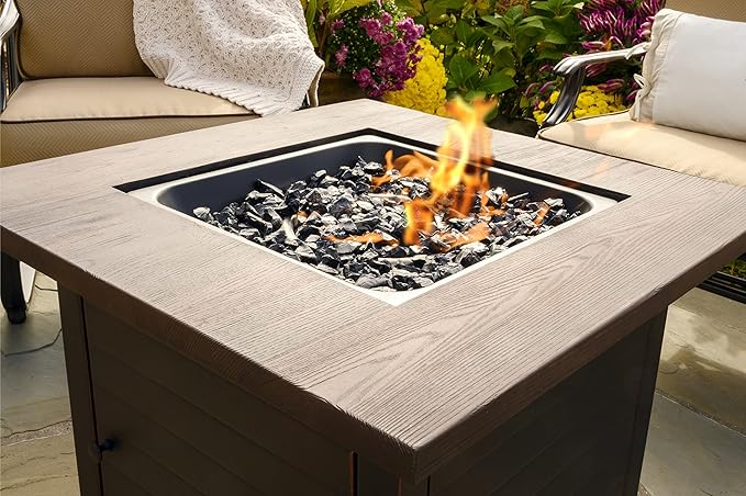 Endless Summer Bronze Finished Black Steel Base with Dark Wood Mantel Spencer LP Gas Outdoor Fire Pit, Comes with Black Fire Glass, Table Insert, and Protective Cover