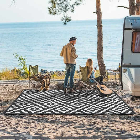 GENIMO Outdoor Rug, Waterproof Plastic Rugs for Patio, 6'x9' Black White | Outside Larger Modern Carpet Mat for Porch Decor, Deck, Balcony, Camping, RV, Backyard, Picnic, Beach, Reversible, Foldable