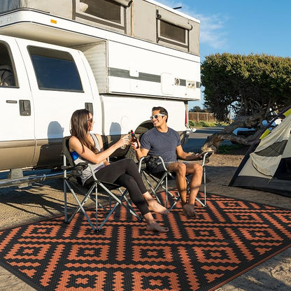GENIMO Outdoor Rug, Waterproof Plastic Rugs for Patio, 6'x9' Black Orange | Outside Larger Modern Carpet Mat for Porch Decor, Deck, Balcony, Camping, RV, Backyard, Picnic, Beach, Reversible, Foldable
